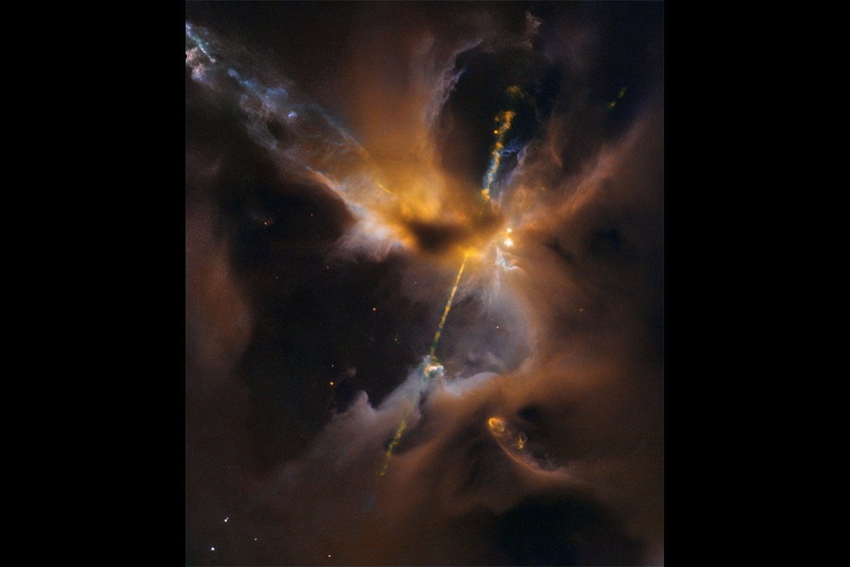 Cosmic Lightsaber Slices Through Clouds in Awesome New Image